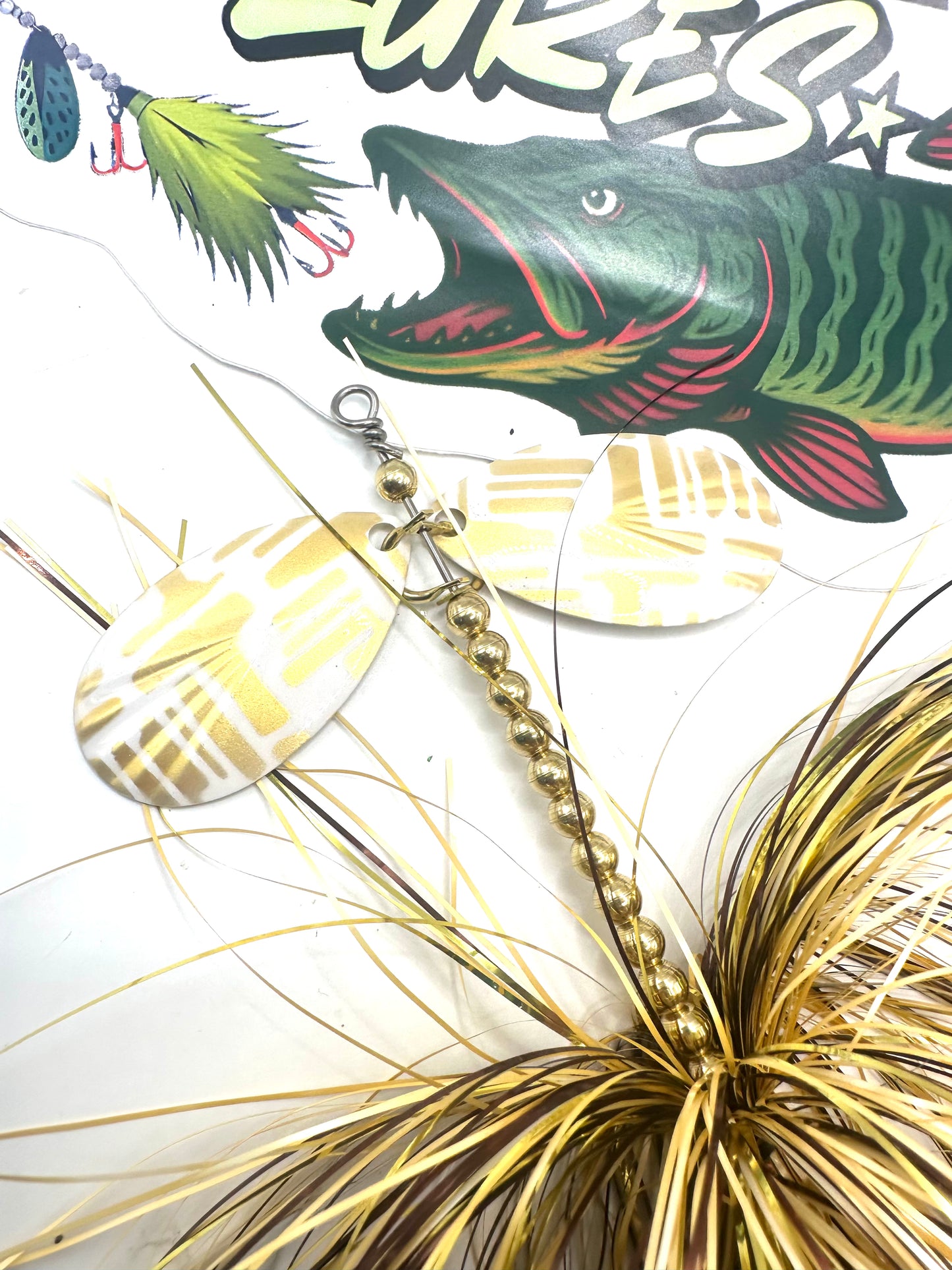 Double 8 Fluted Iced Walleye custom Hootch Blades with Tail Spin
